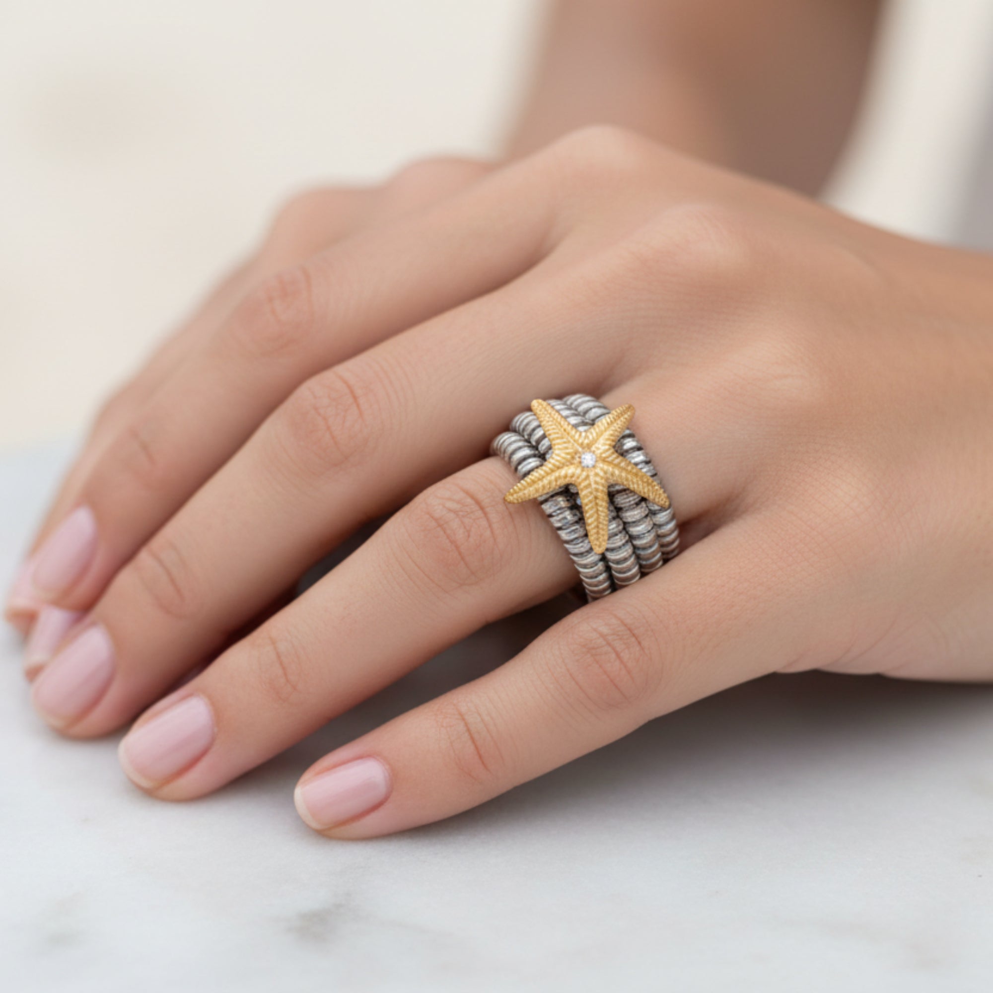6-round steel ring with starfish in 18K GOLD and diamonds