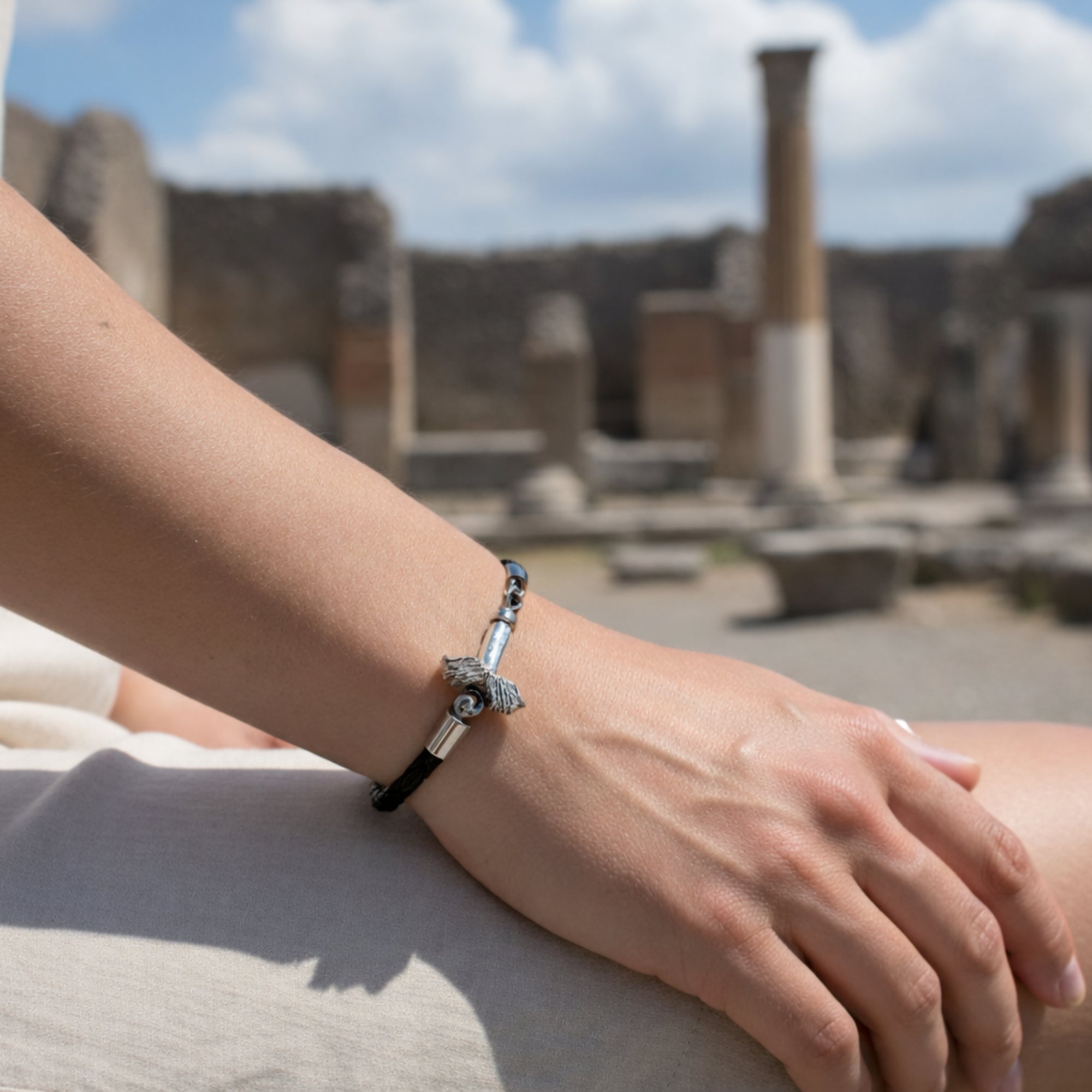 Braided wire bracelet with medium winged phallus - 925 silver