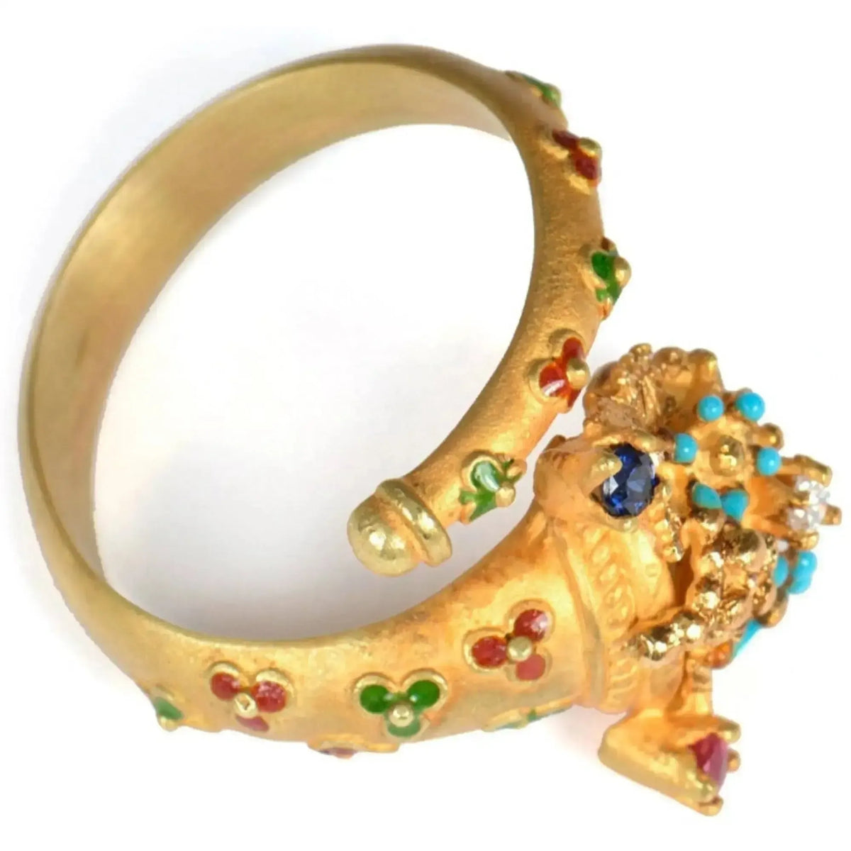 Anillo cornucopia de oro de 18KT con piedras