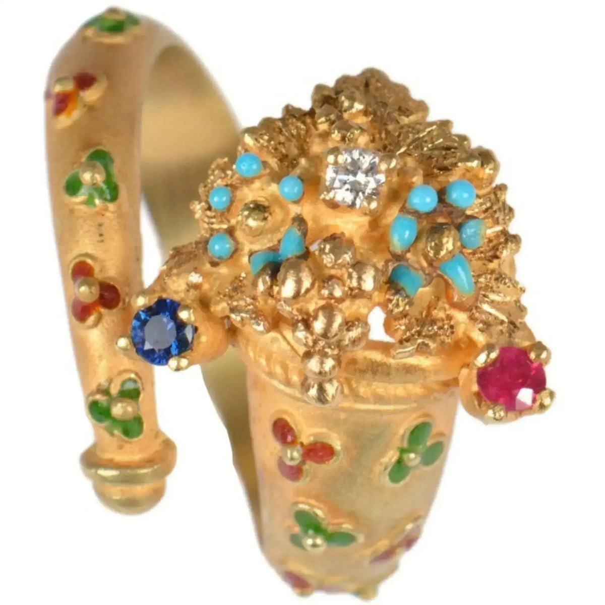 Anillo cornucopia en oro de 18KT con diamante.