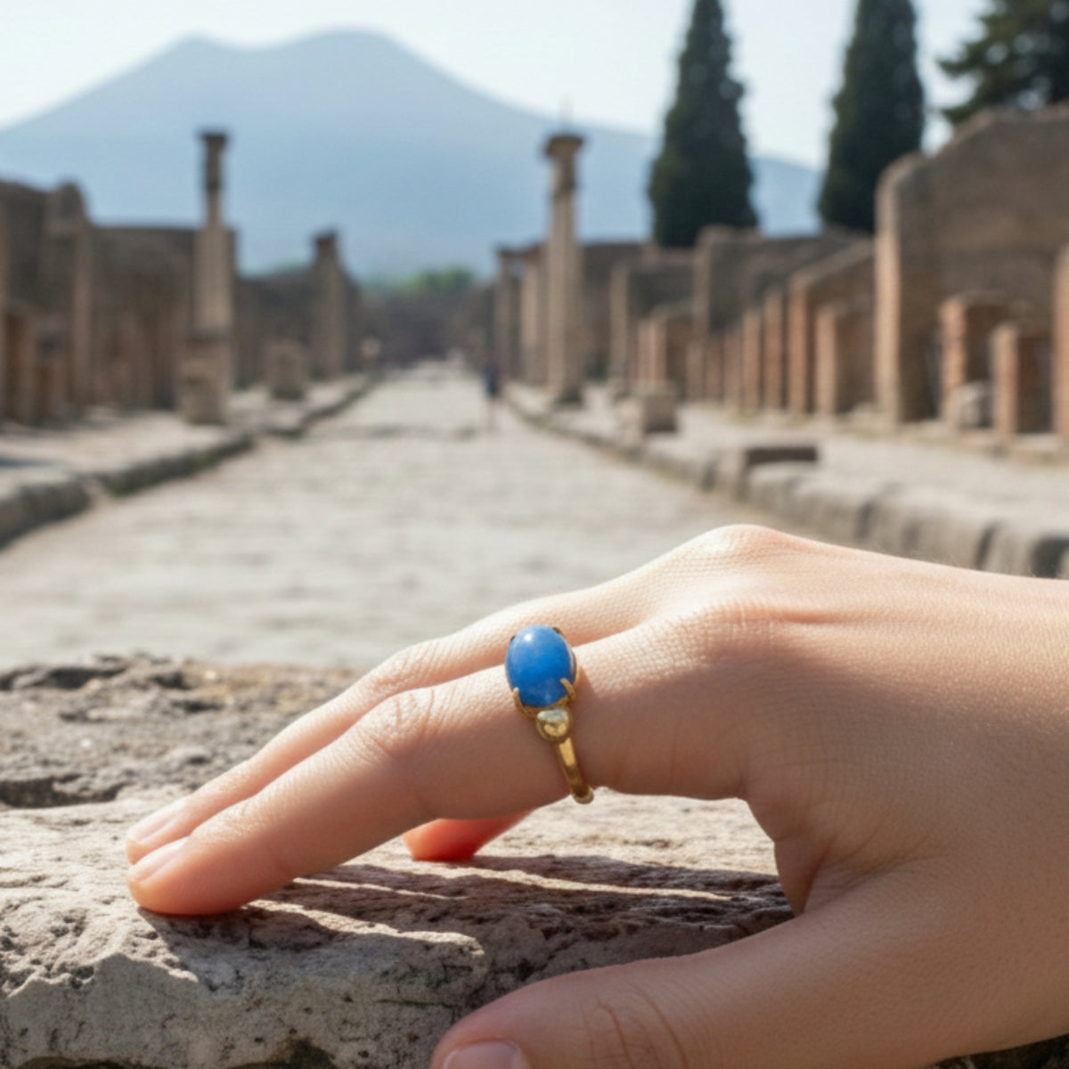 Gold-plated ring with natural stones from Pompeii worn