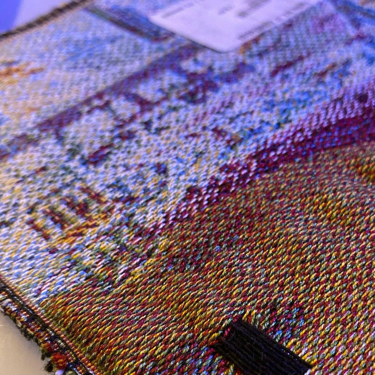 Jacquard tapestry, mouse pad. Detail on the fabric