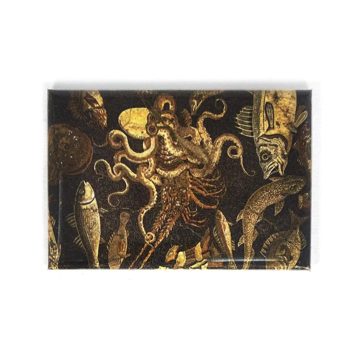 Magnete con mosaico di fauna marina, polpo e pesci su fondo scuro