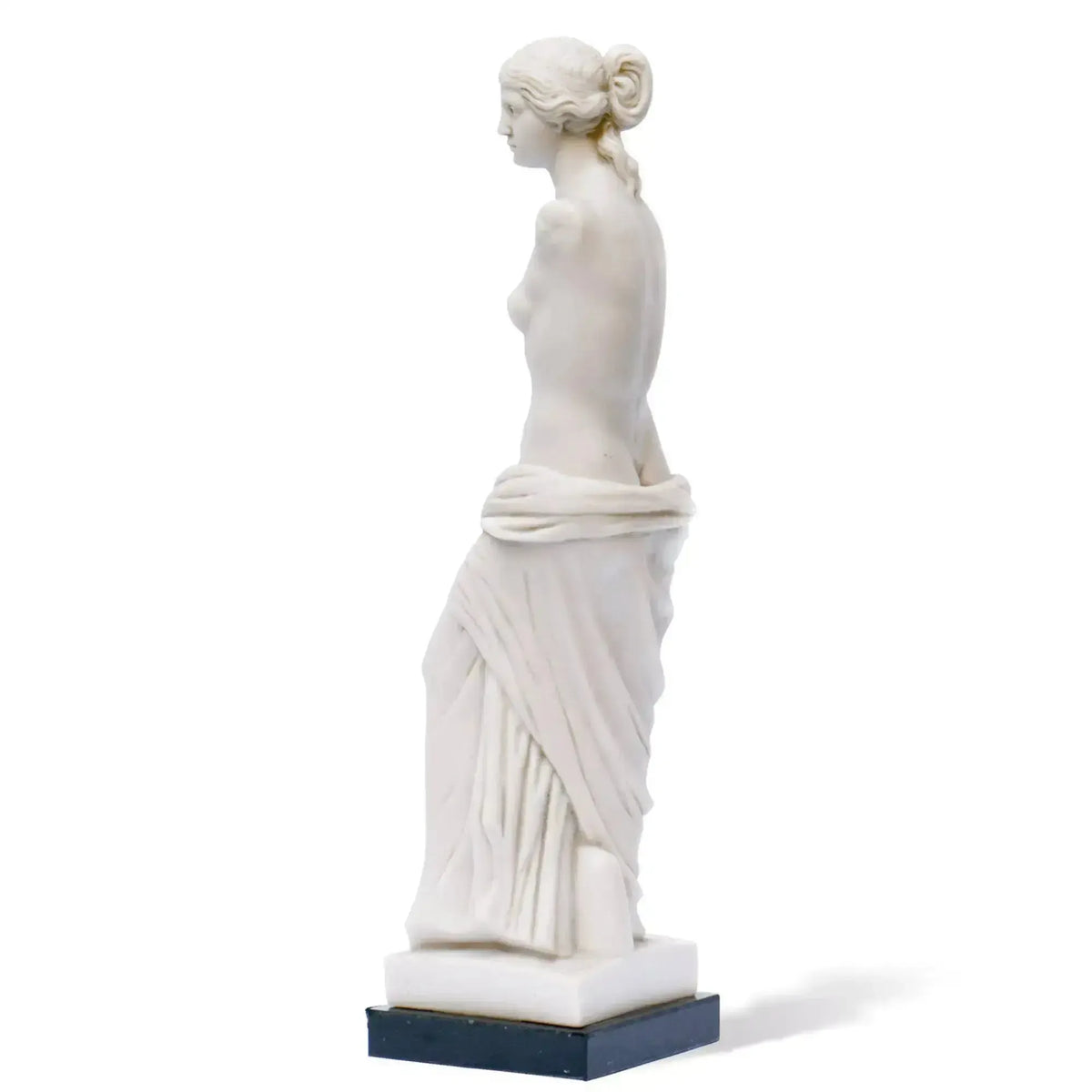 Side view of marble Venus de Milo replica, showing sculptural details.