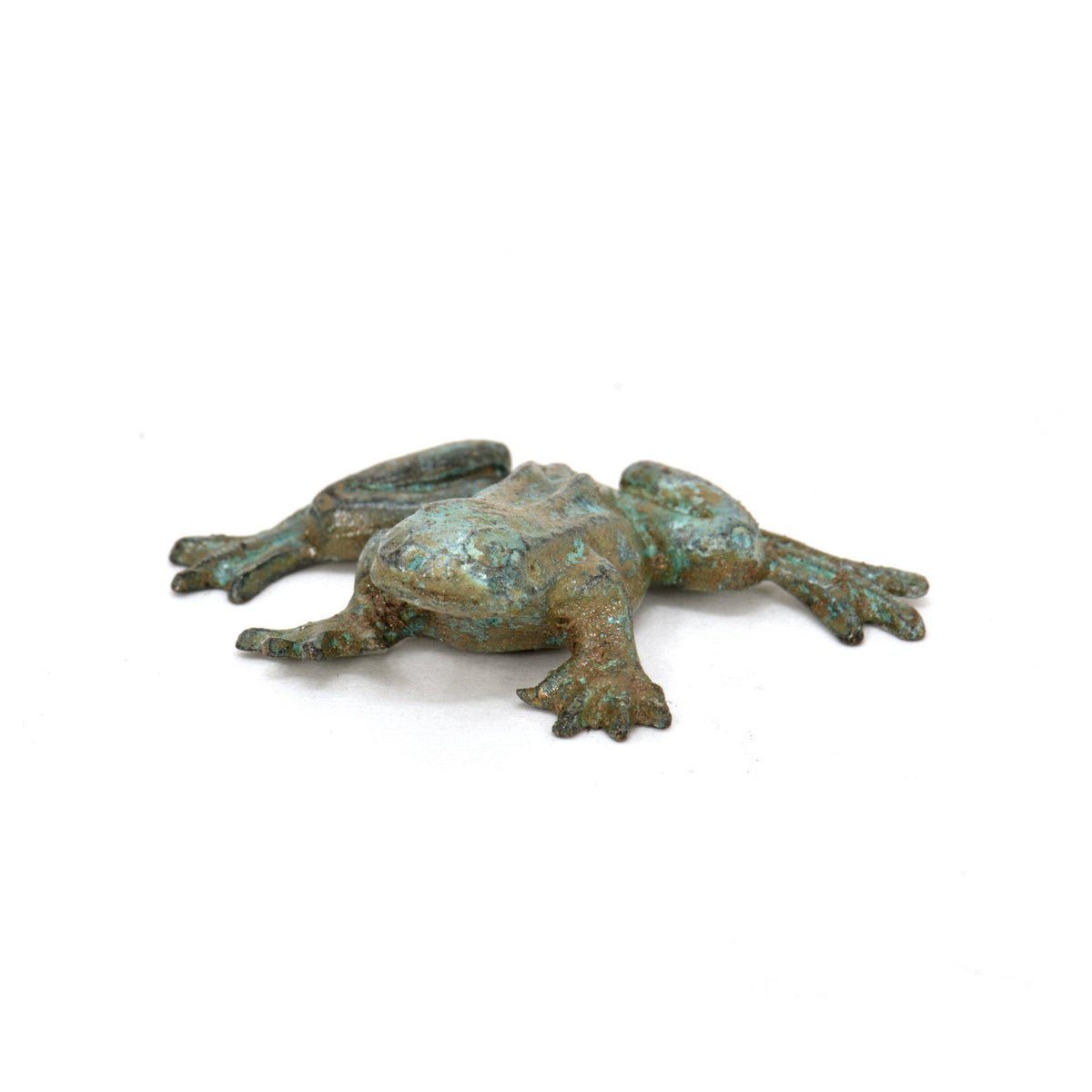 Small bronze frog sculpture with a green-blue patina, shown lying on a white background.